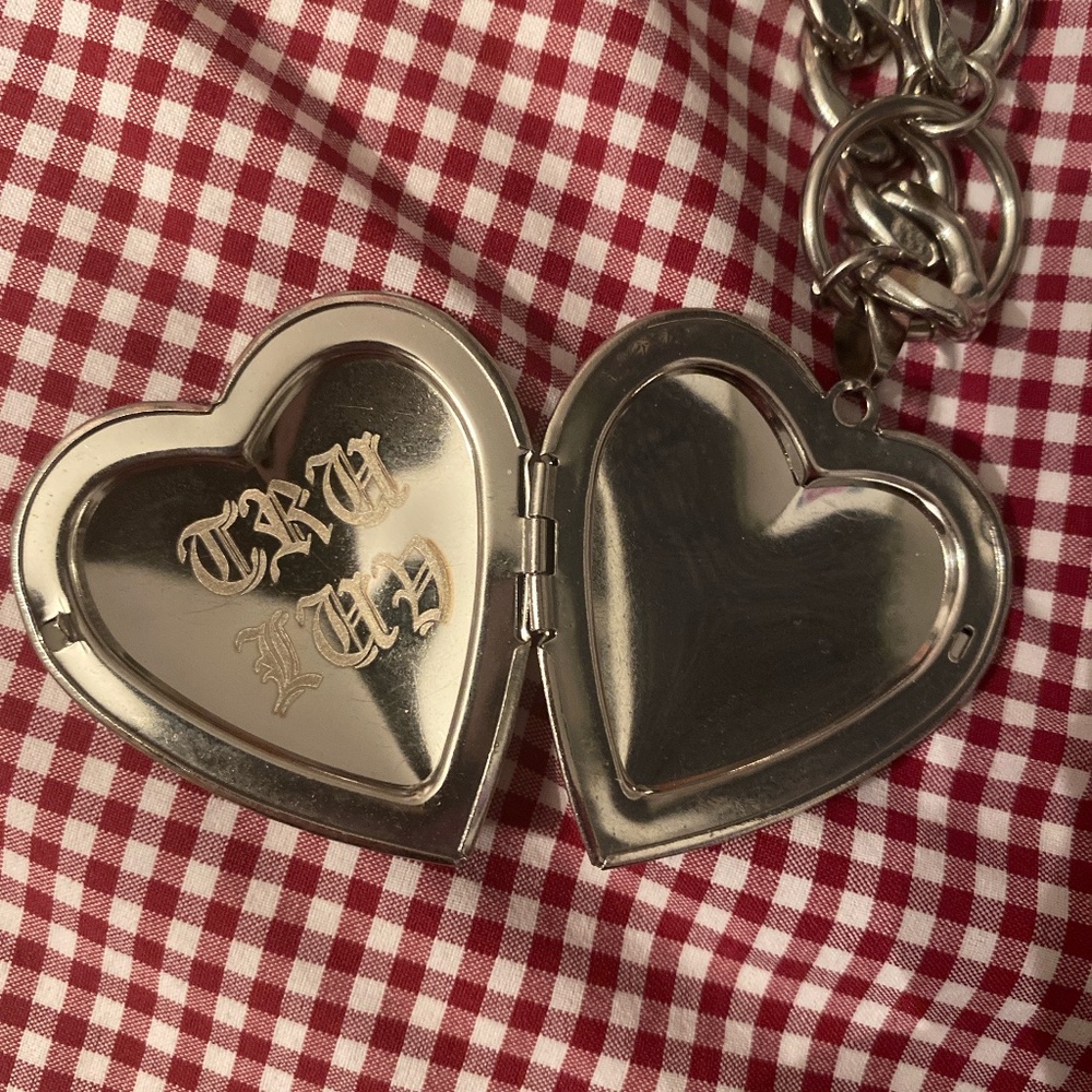 Tunnel Vision silver stainless steel heart locket necklace